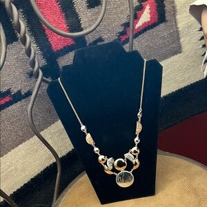 Elegant Gold and Silver Necklace